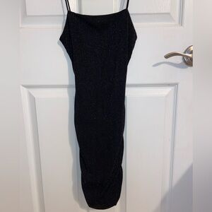 Black Glitter Spaghetti Strap bodycon Dress

Is a mini short dress